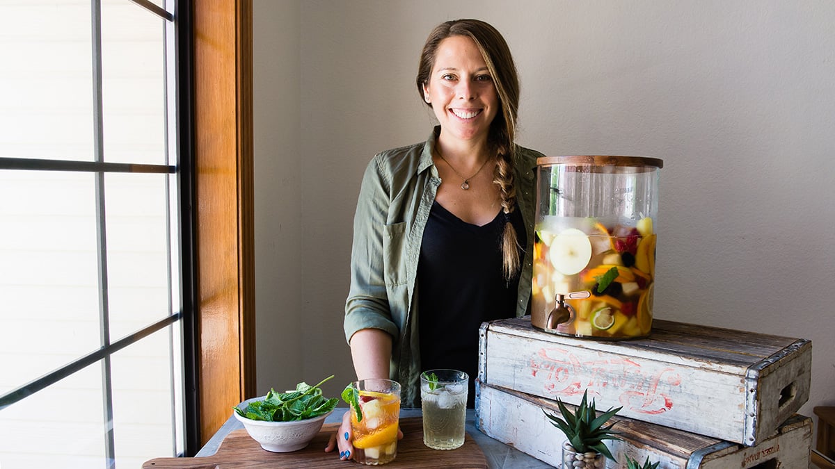 Jen serving a fresh and fruity summer drink