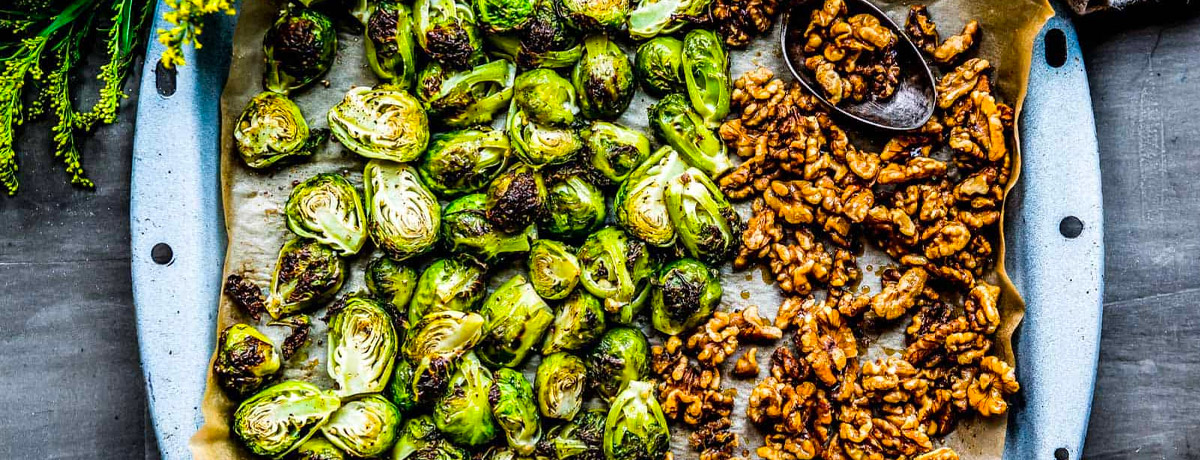 pan of roasted brussels sprouts with walnuts