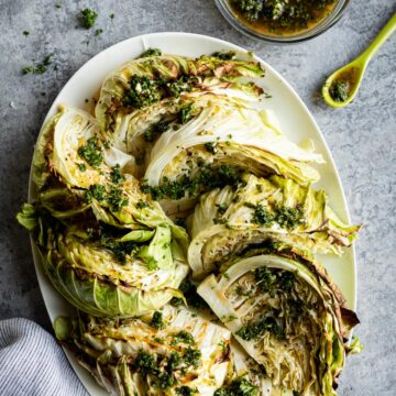 roasted cabbage wedges on a serving platter