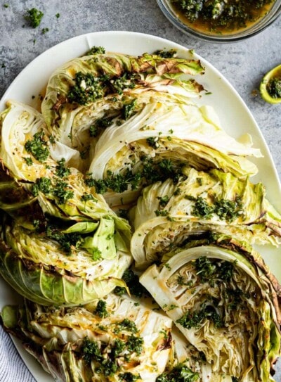 roasted cabbage wedges on a serving platter.