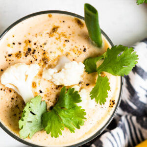 A creamy and savory cauliflower smoothie with cauliflower toppings