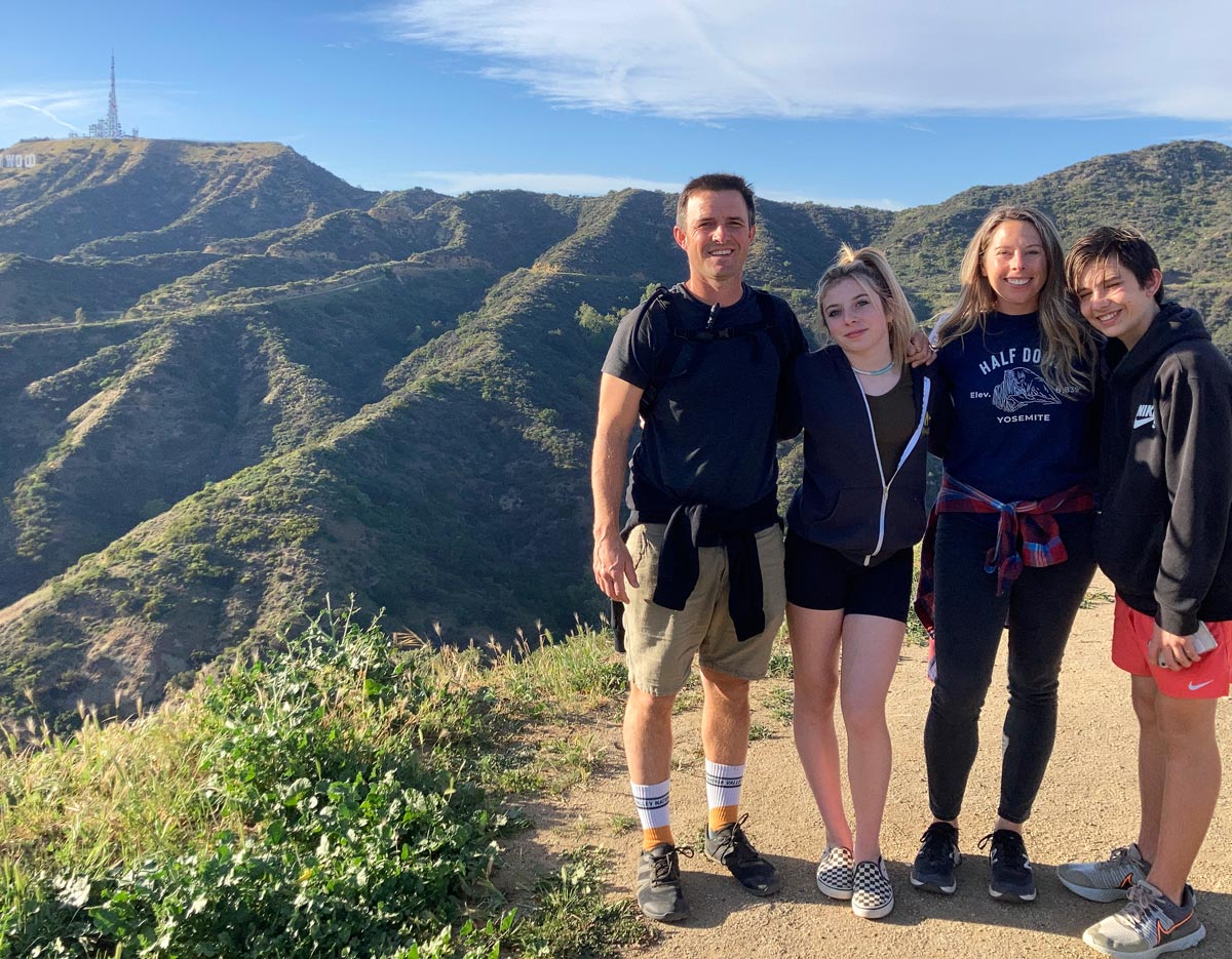 Jen hansard with family hiking along hollywood hills on sunny day.