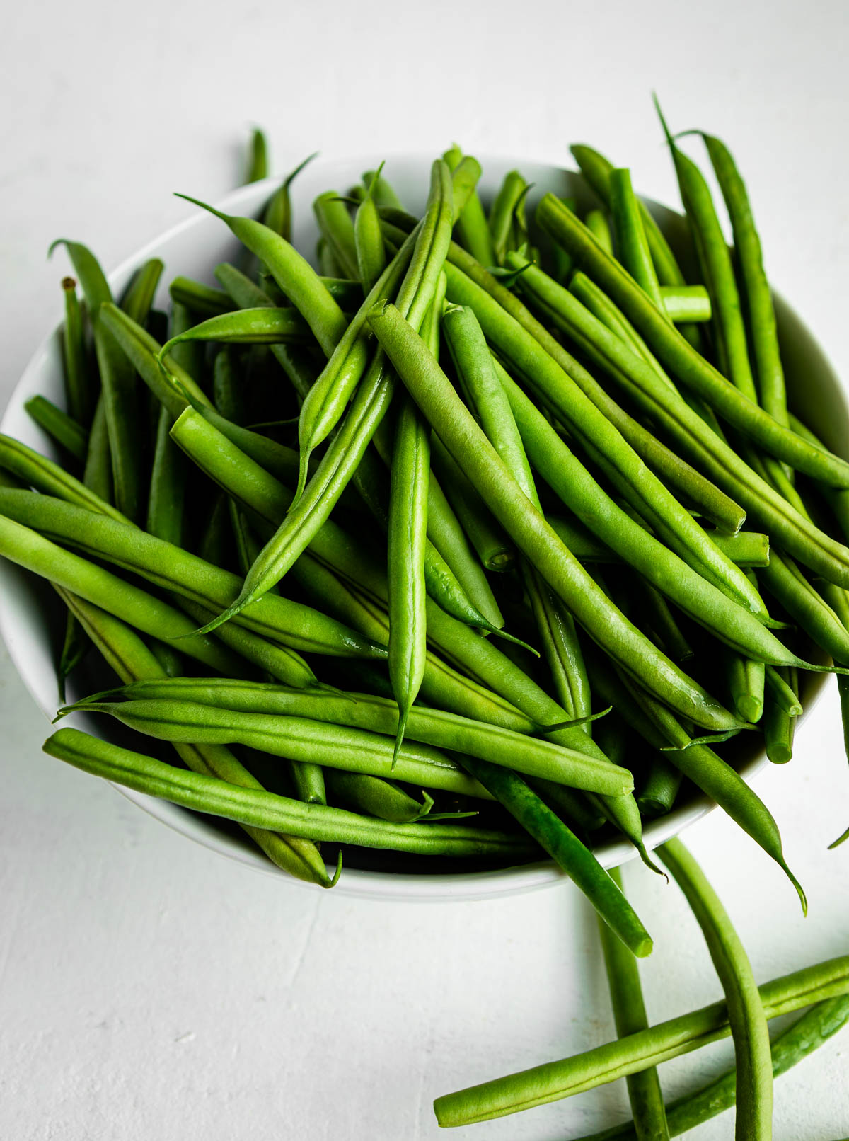 white bowl of fresh beans.