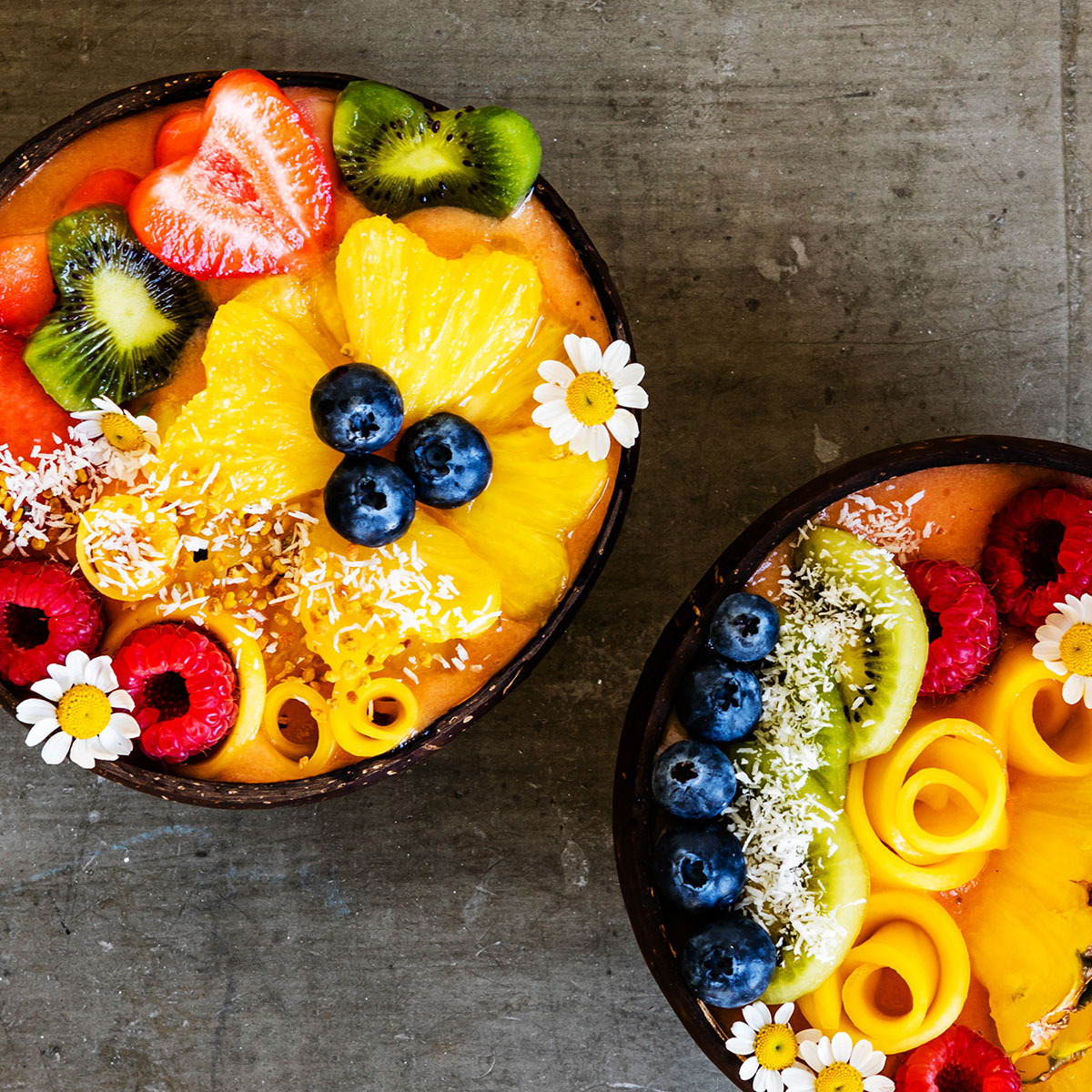 tropical smoothie bowl in a coconut bowl