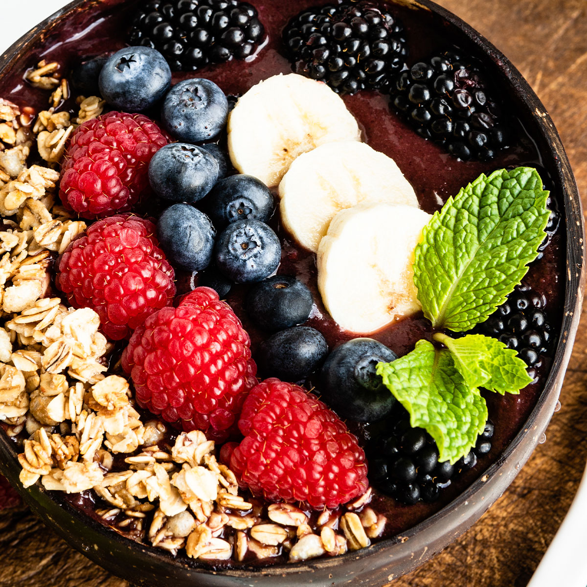 acai smoothie bowl with fresh berries on top