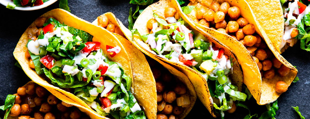 chickpea tacos lined up from left to right