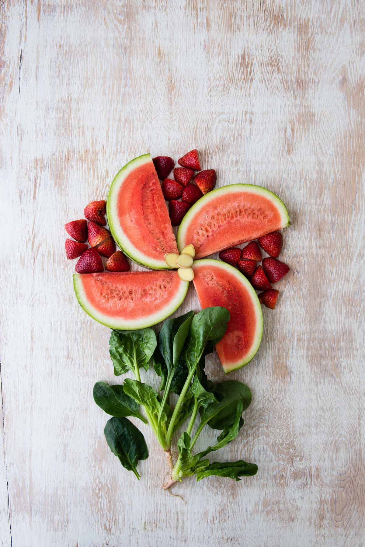 fresh produce arranged to look like a vibrant bouquet of flowers.