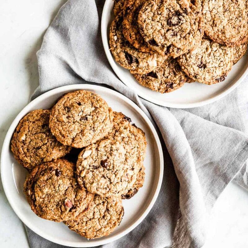 2 plates full of vegan chocolate chip cookies.