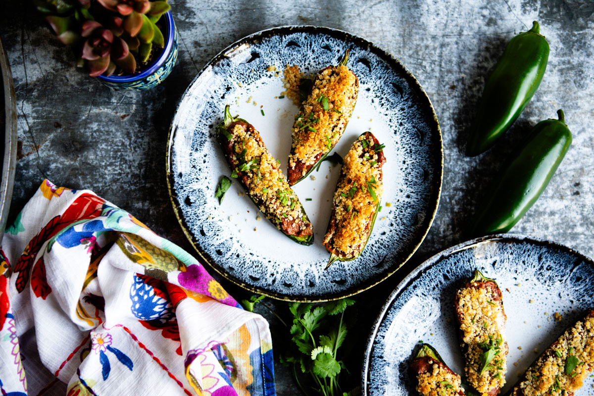 overhead view of jalapenos poppers topped with crispy breadcrumps