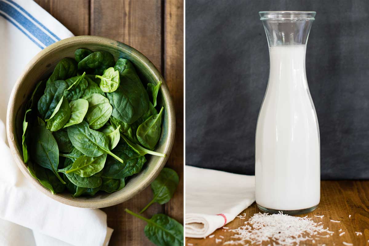 fresh spinach in a bowl next to a pitcher of coconut milk.