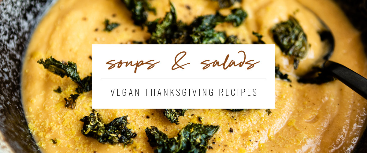 white box with text that reads soups and salads, vegan Thanksgiving recipes overtop creamy potato soup topped with kale croutons.