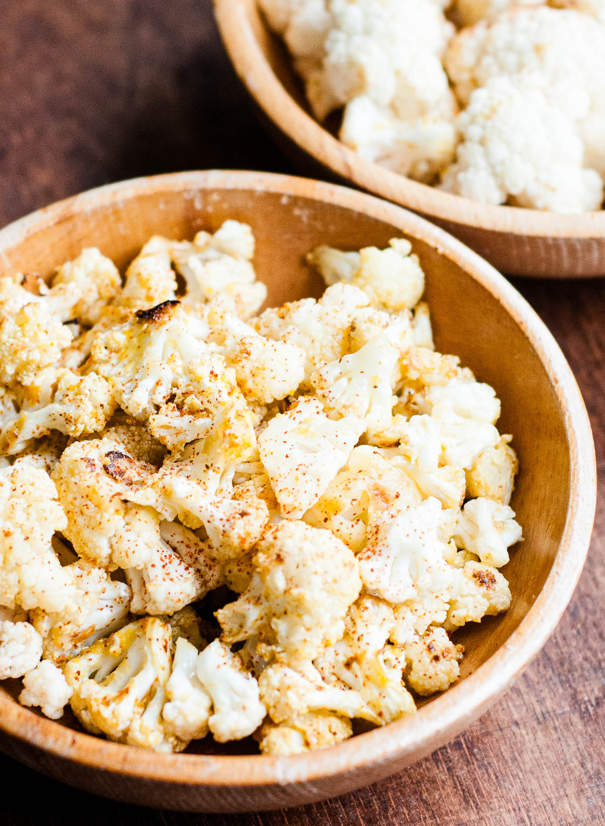 easy winter snack of baked cauliflower in a wooden bowl